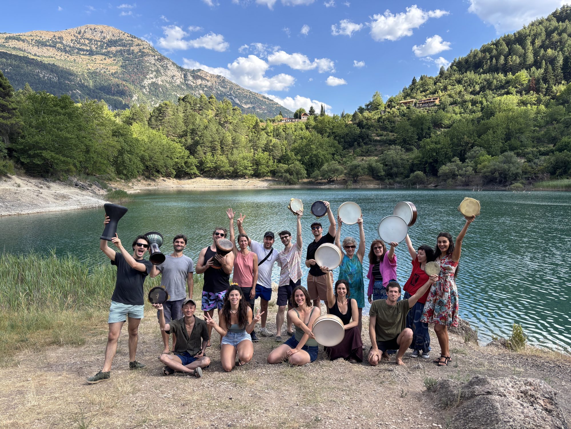 The full group by the mountain lake